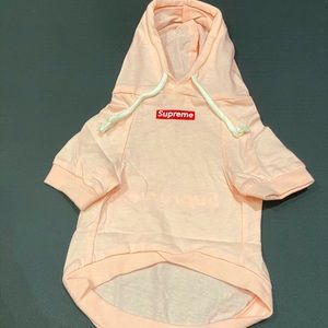Adorable Supreme pink dog hoodie.